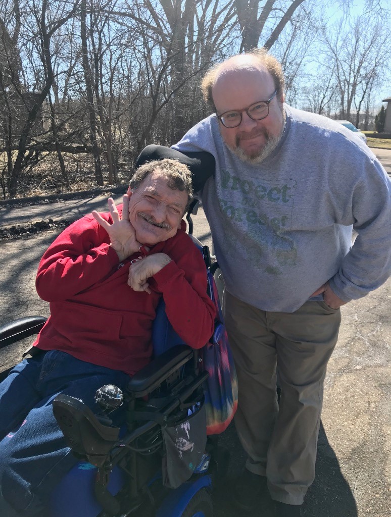 Stephen Heebink, a DSP with MSS, right, is providing day services to Dan Stallsworth at his home.